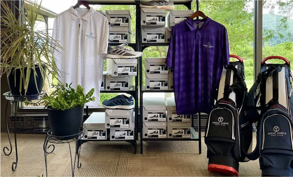 Inside the pro shop at The Great Gorge in Vernon, NJ, featuring a well-organized selection of golf clothing, gear, and accessories in a bright, inviting setting.