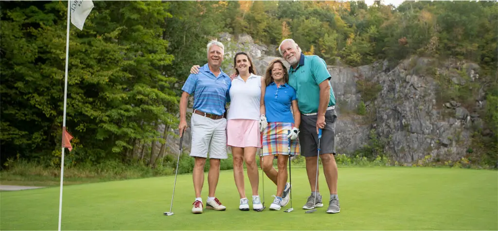 Group of seniors posing at The Great Gorge in Vernon, NJ, smiling and enjoying a day on the course, representing the benefits of senior cards and community engagement.