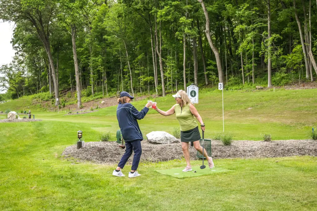 2 women excited after a round of golf in New Jersey