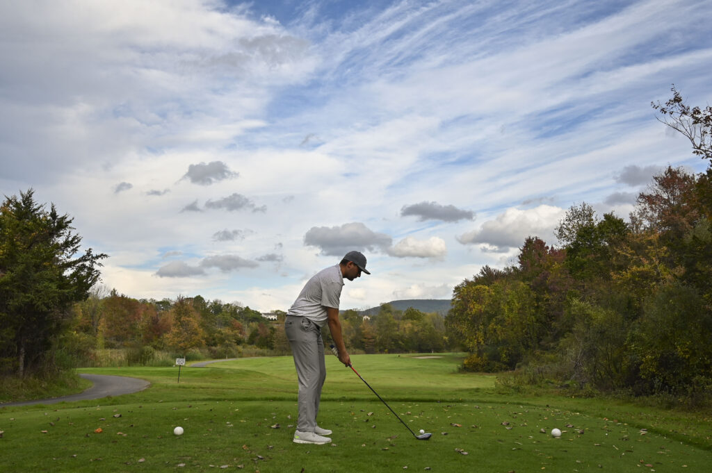 golfer at Great Gorge Golf Club, preparing to hit the ball.