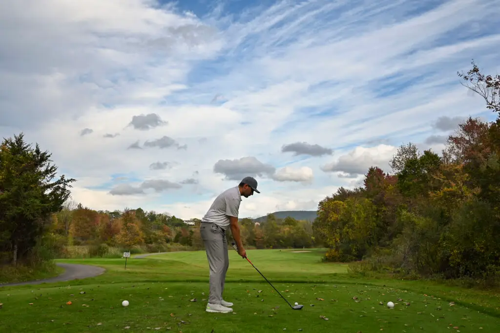 golfer at Great Gorge Golf Club, preparing to hit the ball.